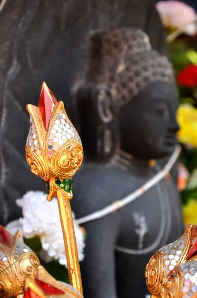 Artificial lotus and Statue of Buddha — Stock Photo, Image