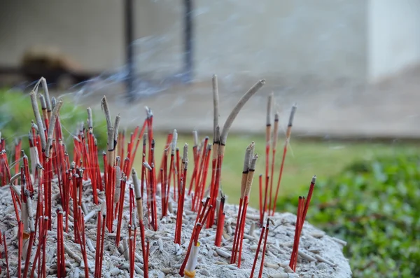 Red joss sticks burn in temple — Stock Photo, Image