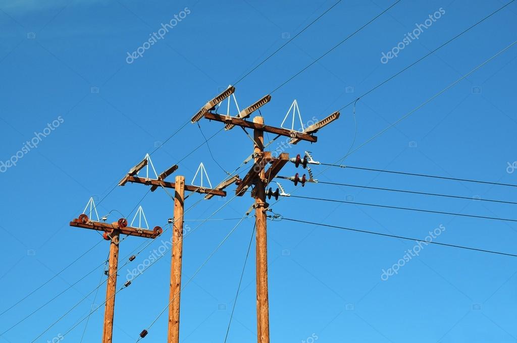 Wood electricity poles ⬇ Stock Photo, Image by © kravka 28954257