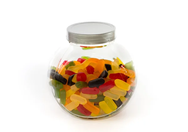 Closed jar filled with wine gums — Stock Photo, Image