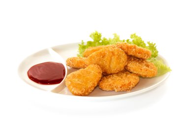 Plate of nuggets with dip sauce clipart