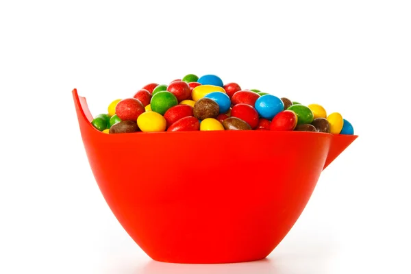 Bowl with colorful chocolate sweets — Stock Photo, Image