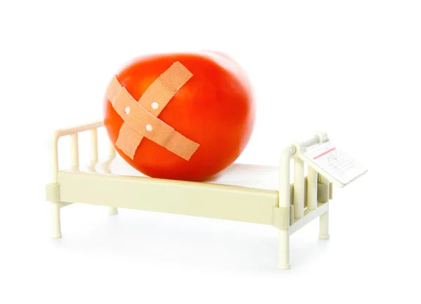 Tomato lies in hospital bed — Stock Photo, Image