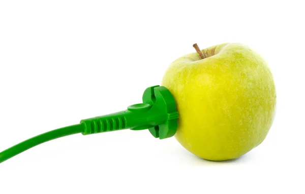 Green power cable attached to apple outlet — Stock Photo, Image