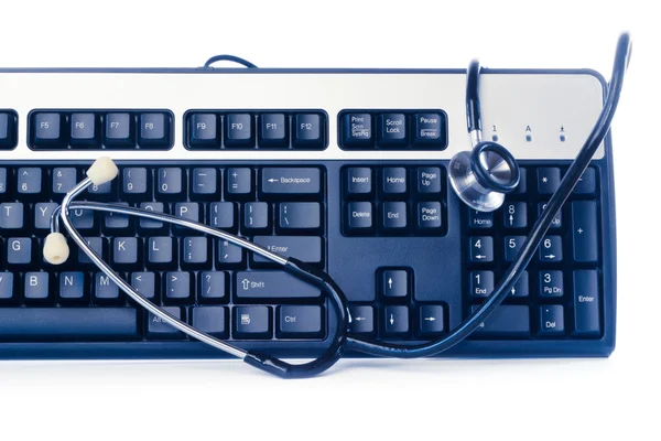 Clavier d'ordinateur bleu avec stéthoscope — Photo