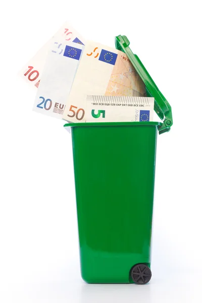 Euro banknotes in green wheelie bin — Stock Photo, Image