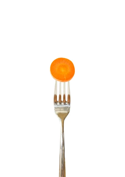 Rebanada de zanahoria clavada en un tenedor —  Fotos de Stock