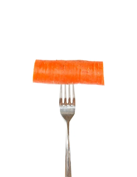Gran trozo de zanahoria clavado en un tenedor —  Fotos de Stock