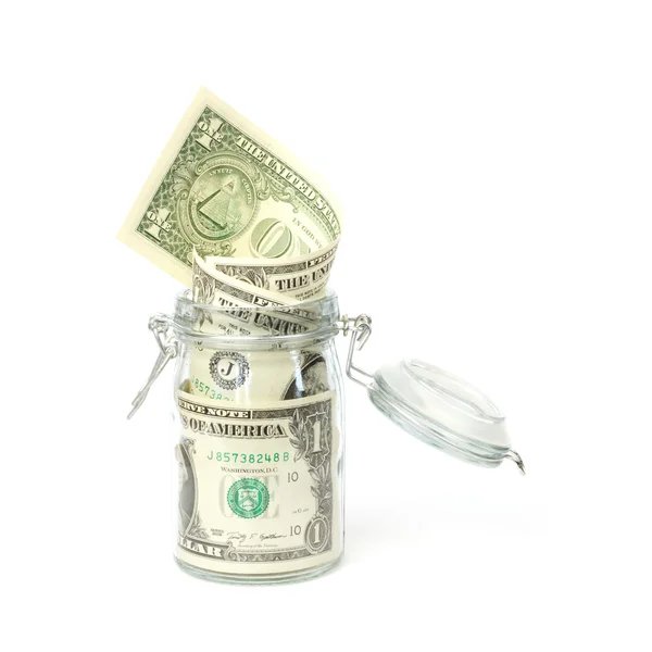 Dollar banknotes in opened jar — Stock Photo, Image