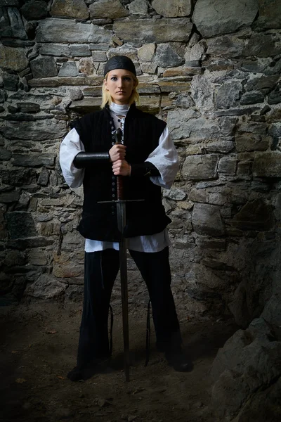 Guardian with medieval sword — Stock Photo, Image