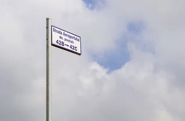 Street signpost along a rural road in Ilfov County with sky on b — Stock Photo, Image