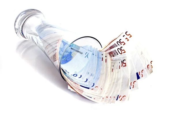 Geld in een glas — Stockfoto