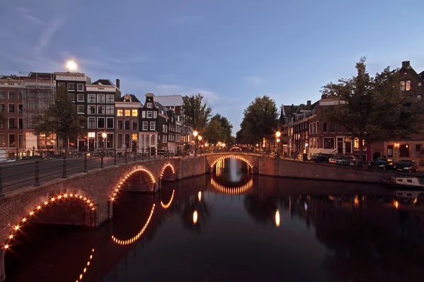 Amsterdam by night in the Netherlands — Stock Photo, Image