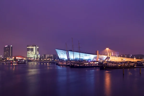 Amsterdam harbor at night in the Netherlands — Stock Photo, Image