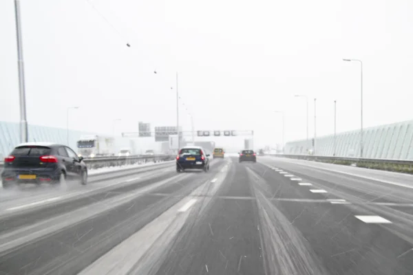 Driving on the highway A10 in a snowstorm in the Netherlands — Stock Photo, Image