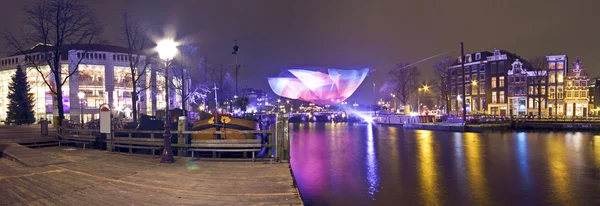 Panorama z Amsterdamu przez noc w Holandii — Zdjęcie stockowe