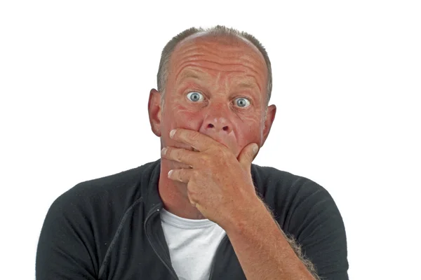 Astonished looking man on a white background — Stock Photo, Image