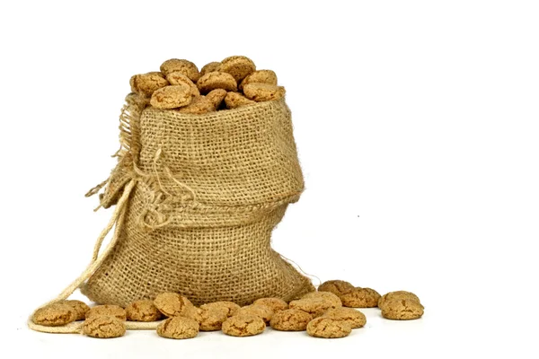 Jute bag full of gingerbread nuts — Stock Photo, Image