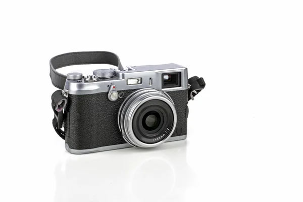 Kamera med retro-look på en vit bakgrund — Stockfoto