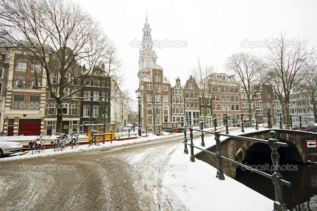 Snowy Amsterdam with the Zuiderkerk in winter in the Netherlands