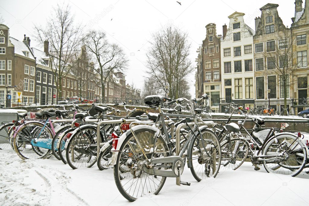 Snowy bikes in Amsterdam the Netherlands