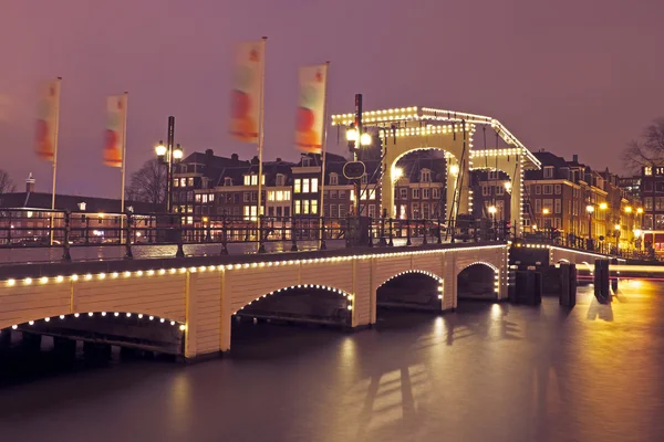 Thiny bridge in Amsterdam the Netherlands by night — Stock Photo, Image