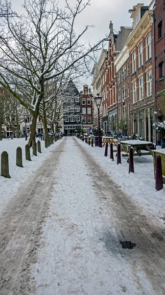 Snowy Amsterdam Talvella Alankomaissa Euroopassa Auringonlaskun Aikaan — kuvapankkivalokuva