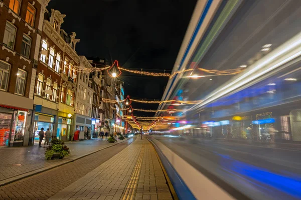 Tram Driving Damrak Christmas Time Amsterdam Netherlands — Stock Photo, Image