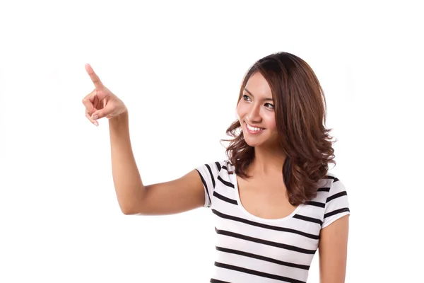 Femme heureuse pointant ou choisissant sur fond blanc isolé — Photo