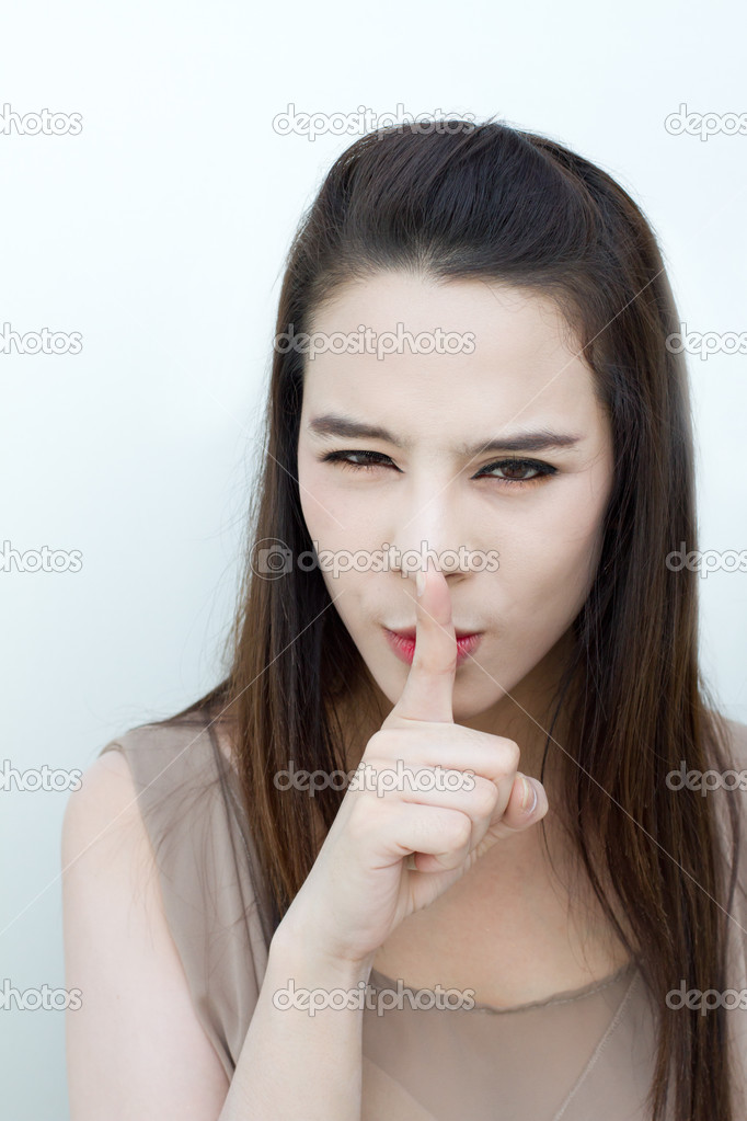 Shh!! silent hand sign from woman