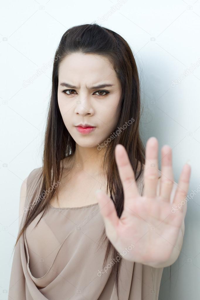 stop hand sign from beautiful woman