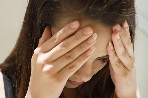 Exhausted woman with headache, migraine, stress — Stock Photo, Image