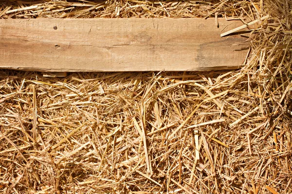 Vintage achtergrond van houten plank en droog gras, hooi, stro textu — Stockfoto