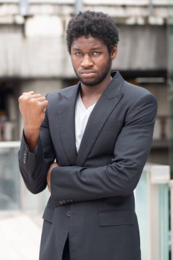 Successful and confident black African office workeer