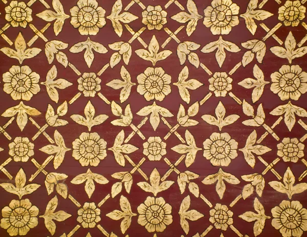 Motif de fleurs dans l'art traditionnel de style thaï sur le mur du temple — Photo