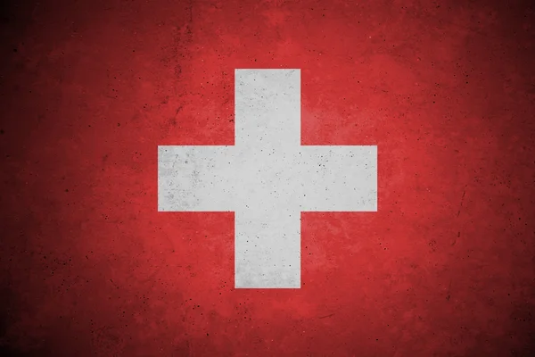 Wzór flaga Szwajcarii na betonową ścianą. — Zdjęcie stockowe