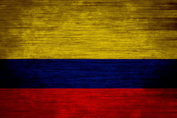 Colombia flagga på trä textur — Stockfoto