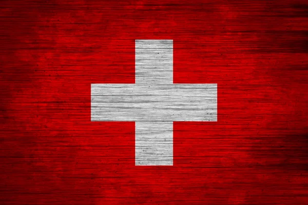 Текстура дерева с флагом Швейцарии — стоковое фото