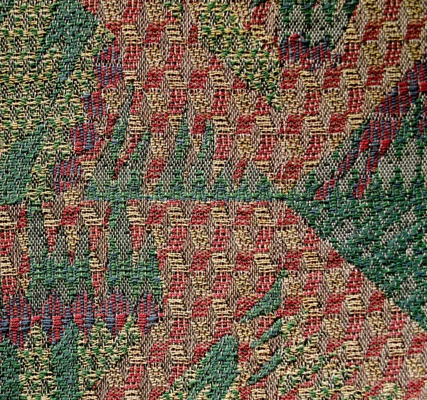 พื้นหลังอักษรของผ้า — ภาพถ่ายสต็อก