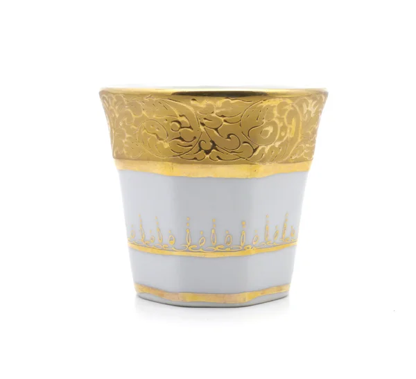 Zlatá barva bílá pohár izolovaných na bílém pozadí — Stock fotografie