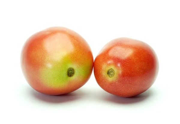 Dois tomates no fundo branco . — Fotografia de Stock