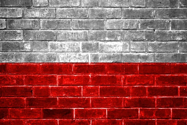 Bandeira da Polónia pintada numa parede de tijolos — Fotografia de Stock