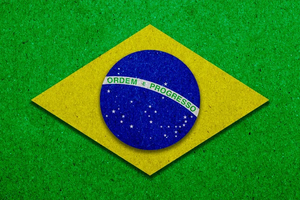 Brazilië grunge vlag op papier achtergrond — Stockfoto
