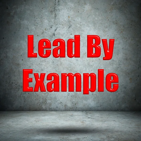 Lead By Example concrete wall — Stock Photo, Image