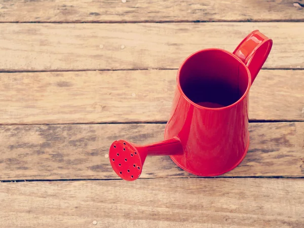 Red watering can retro vintage style — Stock Photo, Image
