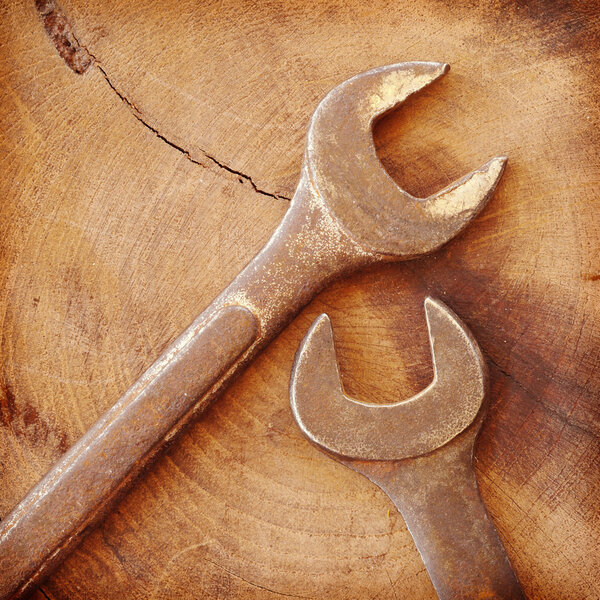 wrench on wood old retro vintage style