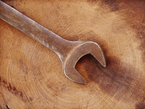 Wrench on wood old retro vintage style — Stock Photo, Image
