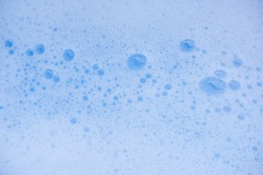 Soyut arka plan beyaz sabunlu köpük dokusu. Köpüklü şampuan köpüğü.