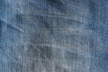 old grunge blue jeans texture background 