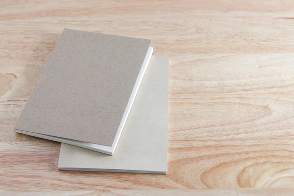 Recycled paper book on wooden background